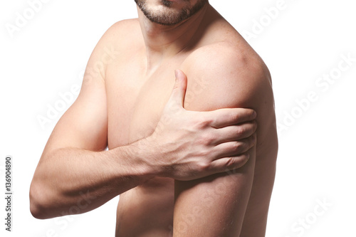 Man with shoulder pain on w...