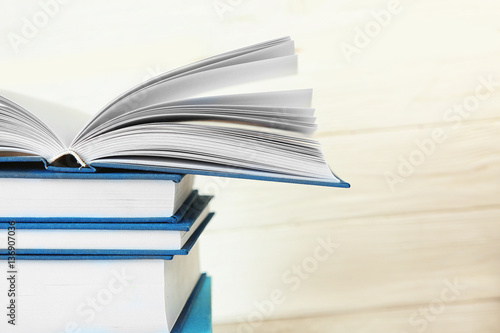 New books on wooden  background