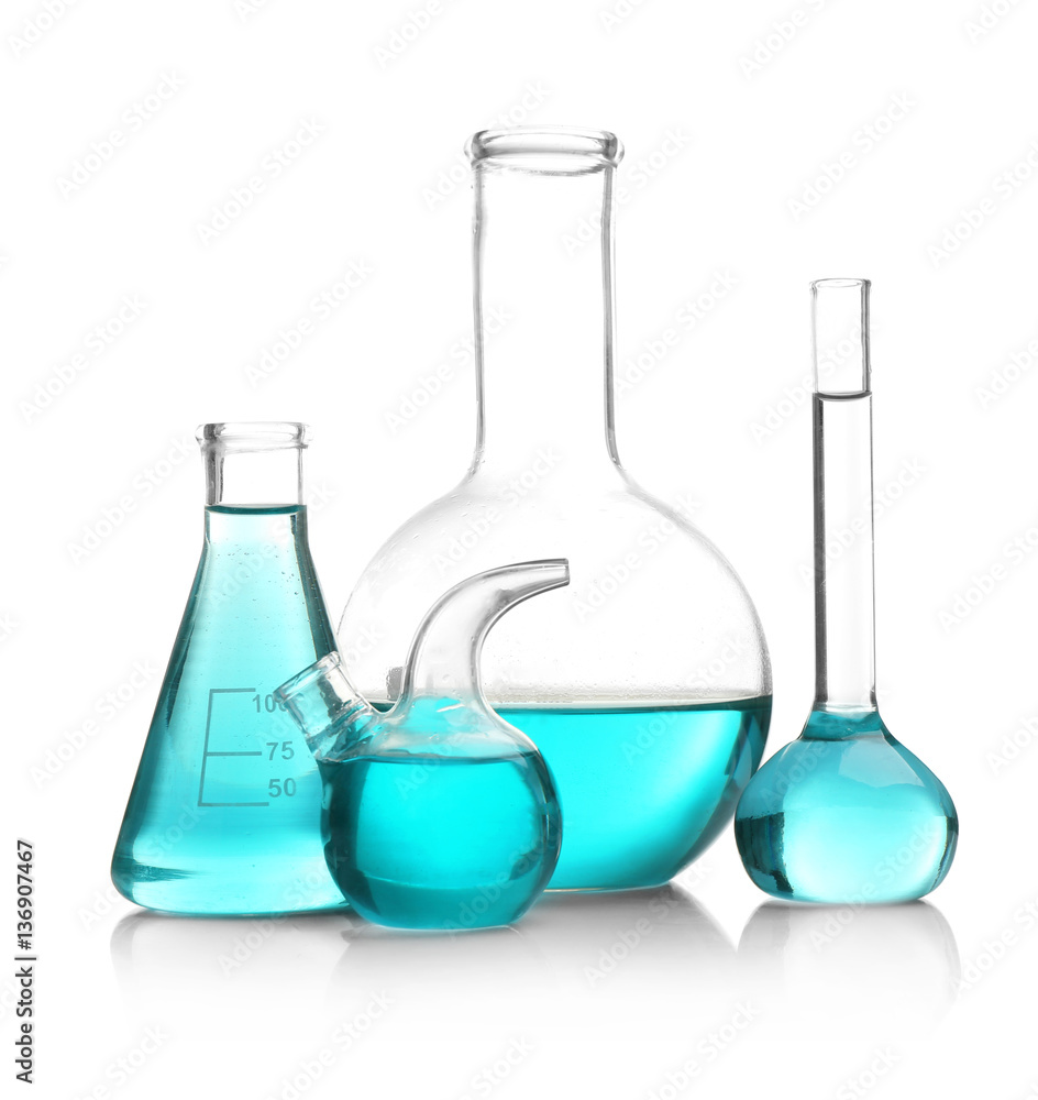Laboratory glassware with blue samples on white background Laboratory glassware with blue samples on white background