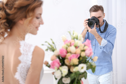 Wedding photographer taking...