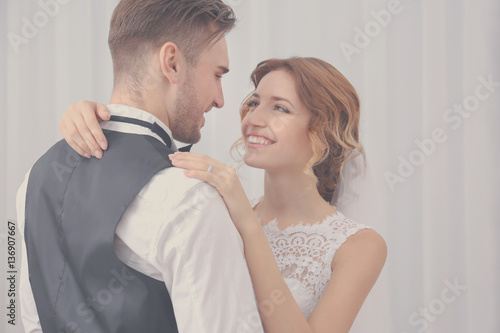 Cute happy wedding couple a...