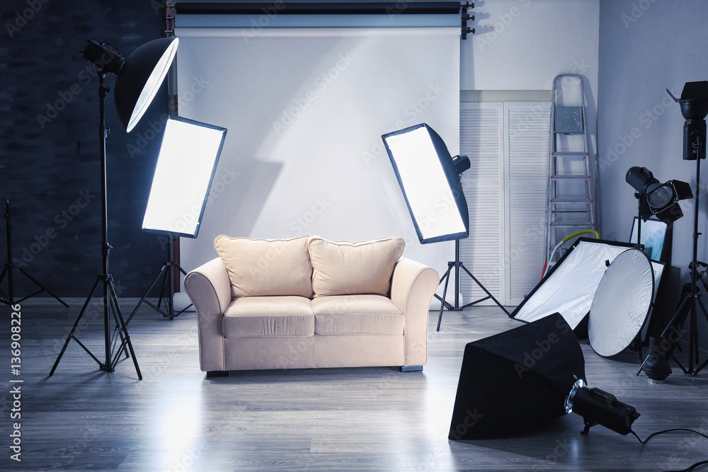Fototapeta premium Photo studio with modern interior and lighting equipment