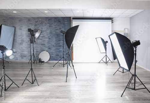 Empty photo studio with lig...