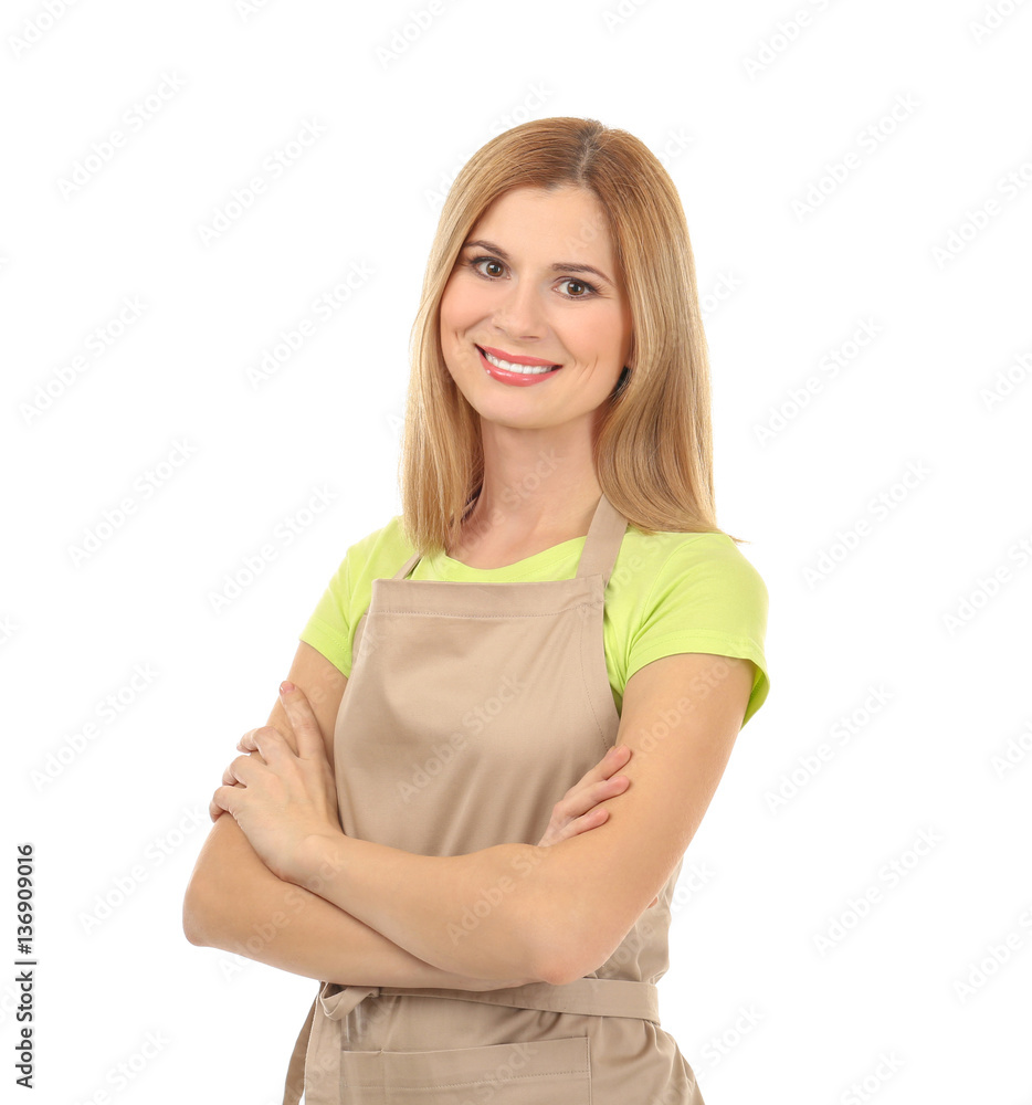Beautiful woman in beige apron isolated on white background Beautiful woman in beige apron isolated on white background