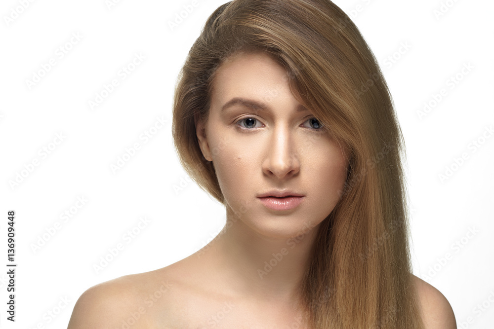 Studio shot of young beautiful woman with nude makeup Studio shot of young beautiful woman with nude makeup