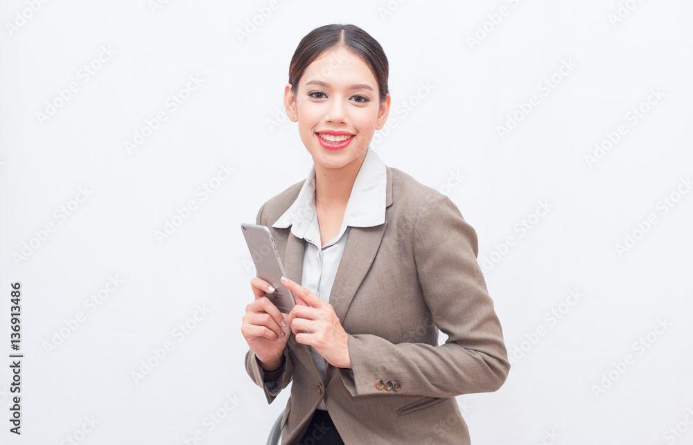 Businesswoman use of mobile phone. young woman used smart phone and tablet. Businesswoman use of mobile phone. young woman used smart phone and tablet.