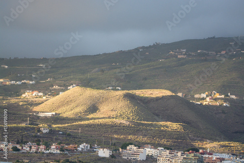 Sunset on Tenerife - small volcanos in countryside photo