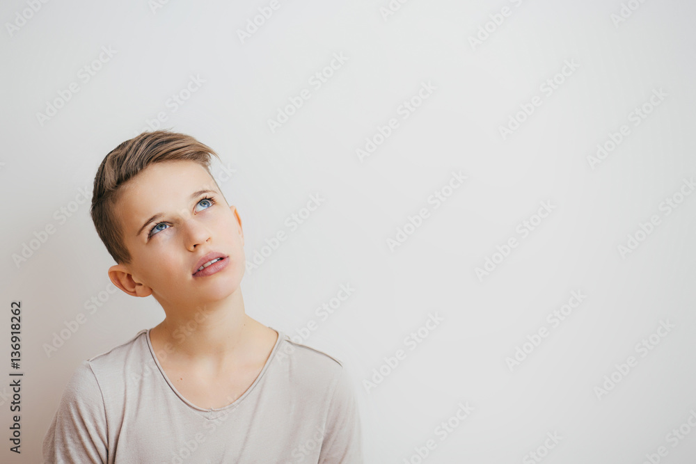 Portrait of a Young boy looking up Portrait of a Young boy looking up