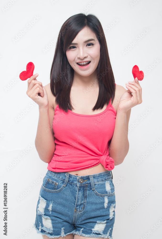 valentine day concept, Young woman holding a red heart valentine day concept, Young woman holding a red heart