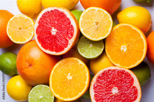 citrus fruit  orange  lime  lemon and grapefruit on a table