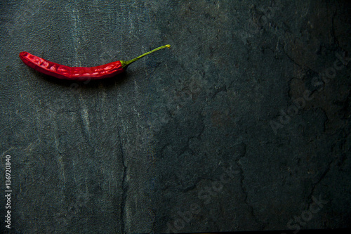 red hot chili on wooden table