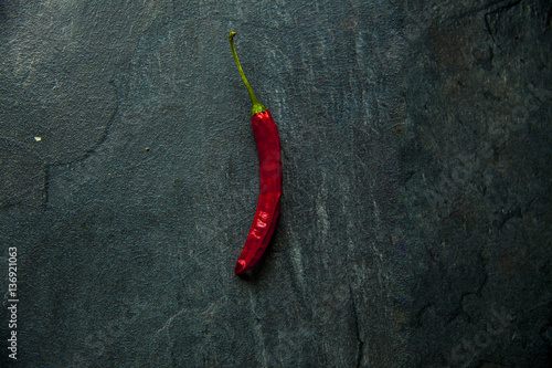 red hot chili on wooden table