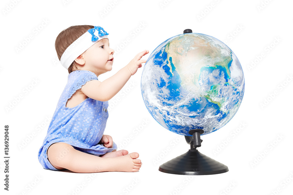 Cute little girl sitting with a globe. Elements of this image furnished by NASA.
Cute little girl sitting with a globe. Elements of this image furnished by NASA.