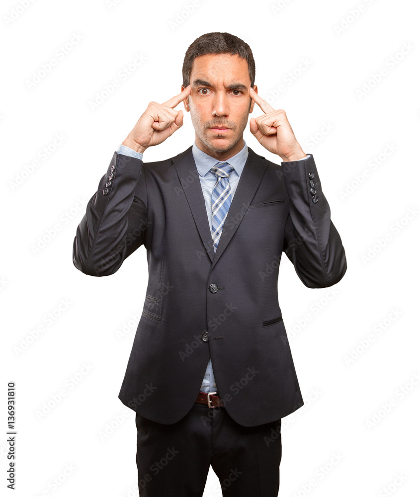 Young businessman doing a concentration gesture Young businessman doing a concentration gesture