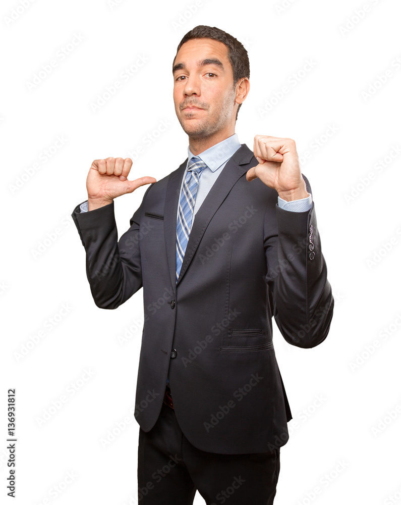 Satisfied businessman doing a victory gesture Satisfied businessman doing a victory gesture