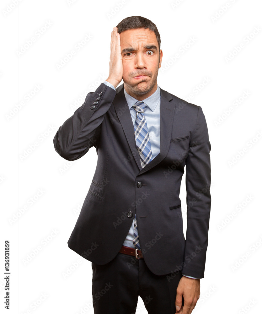 Stressed young man doing a gesture of depression Stressed young man doing a gesture of depression