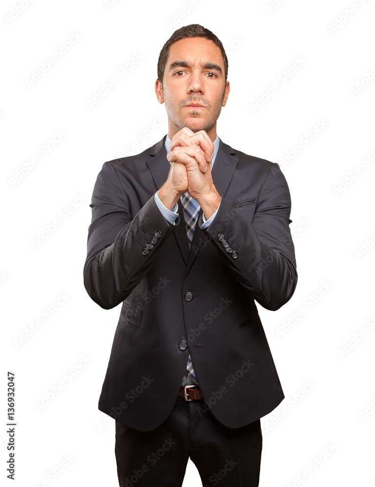 Concept of a businessman doing a gesture of teamwork Concept of a businessman doing a gesture of teamwork