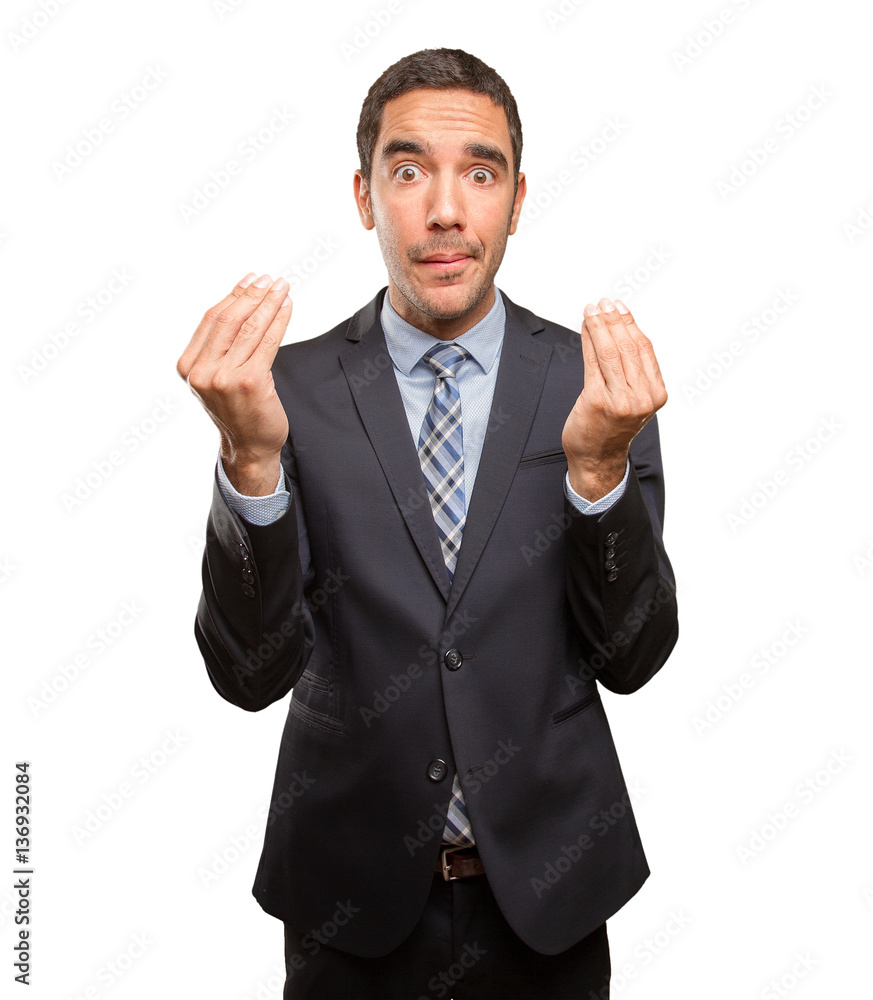 Worried businessman doing a puzzled gesture Worried businessman doing a puzzled gesture