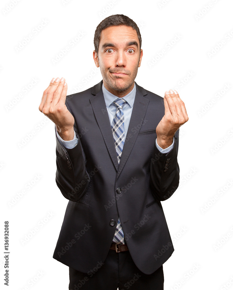 Worried businessman doing a puzzled gesture Worried businessman doing a puzzled gesture