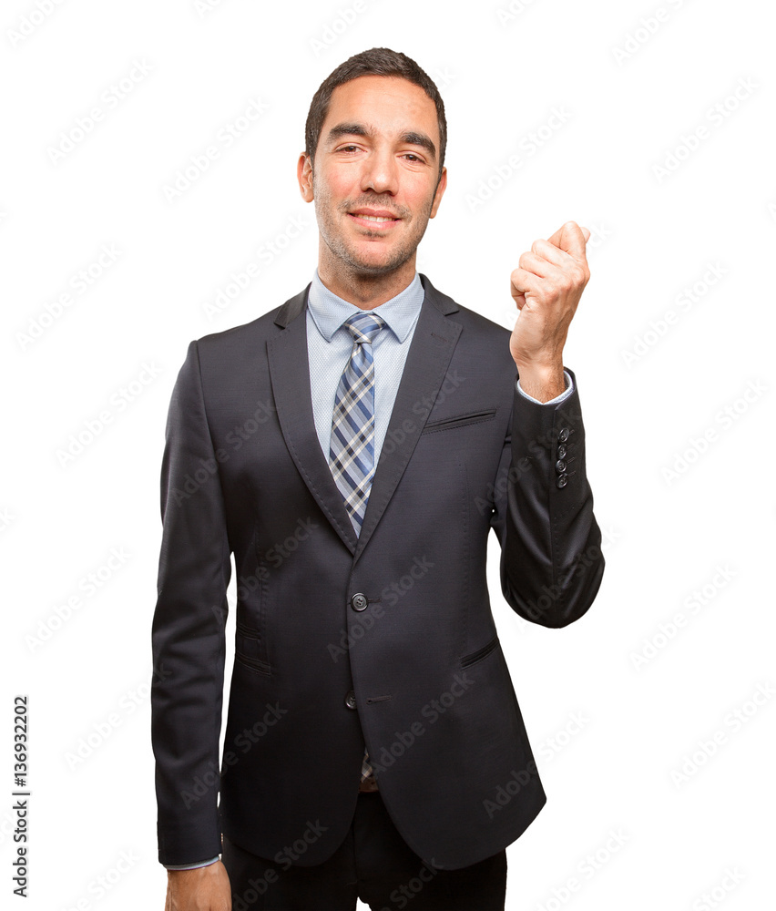 Happy young businessman doing a money gesture Happy young businessman doing a money gesture