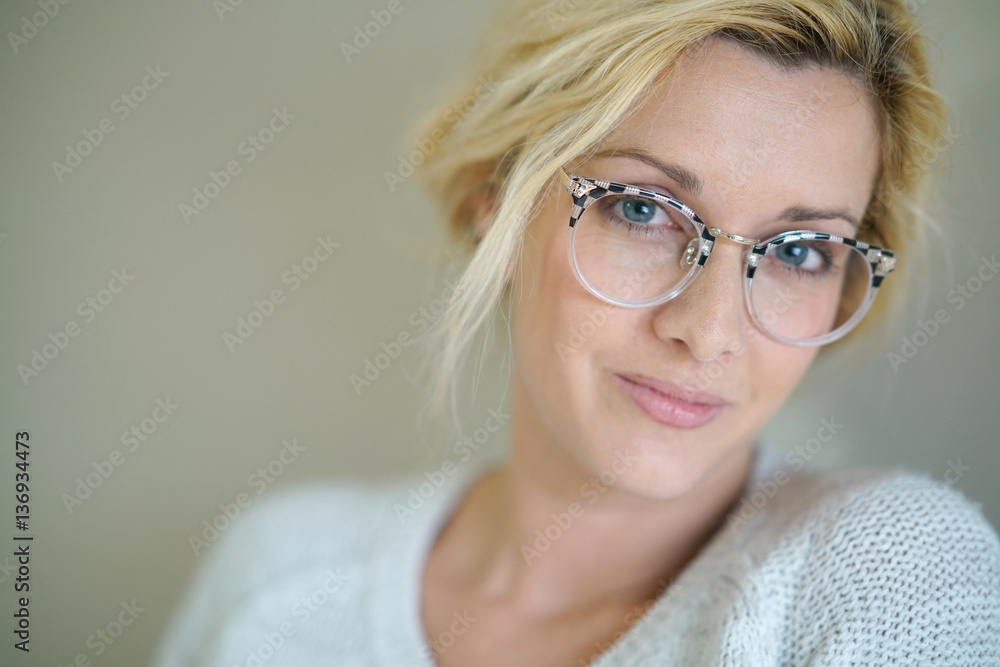 Potrait of beautiful blond woman with eyeglasses, isolated