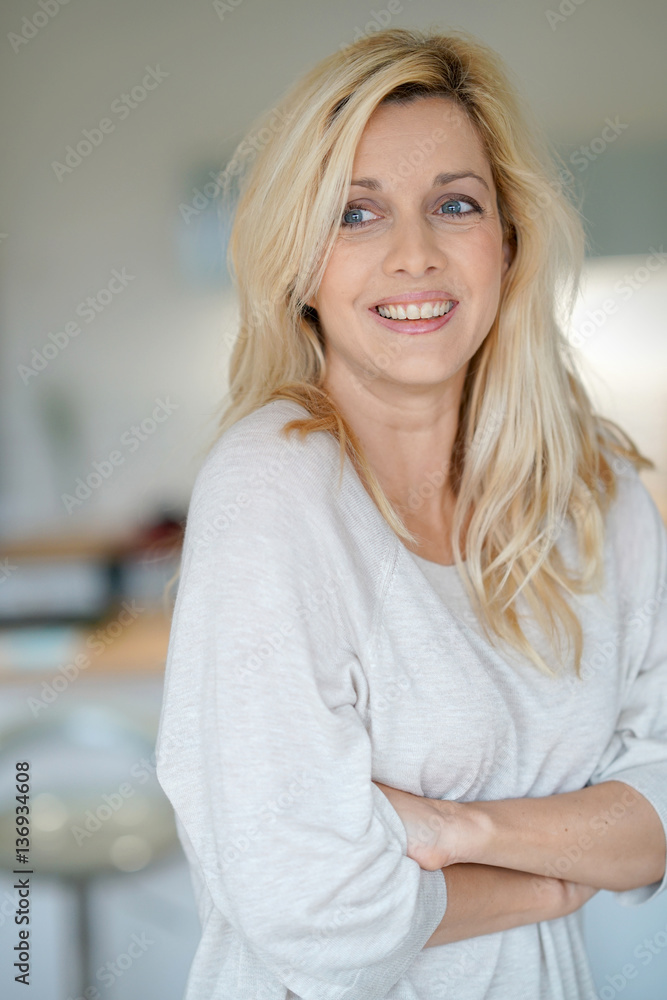 portrait of cheerful middle-aged blond woman portrait of cheerful middle-aged blond woman