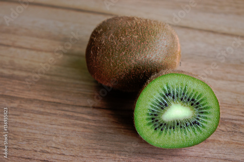Closeup of kiwi on a wooden table