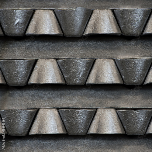 Obraz na plátně Stack of raw aluminum ingots in aluminum profiles factory