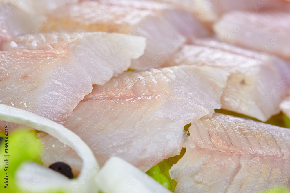 Fillet of a lightly salted grayling closeup Fillet of a lightly salted grayling closeup