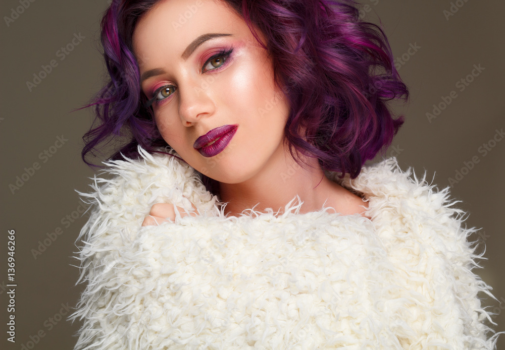 Portrait of beautiful sexy fashion model with purple hair over g Portrait of beautiful sexy fashion model with purple hair over g