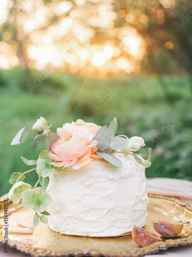 wedding cake with fresh flowers