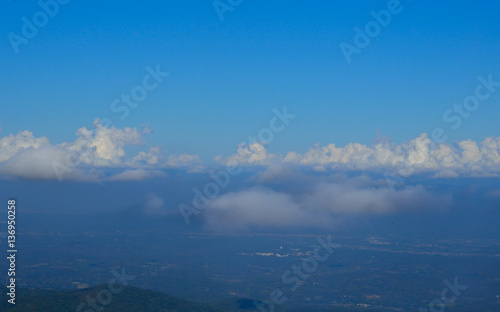 clouds in the blue sky over city view