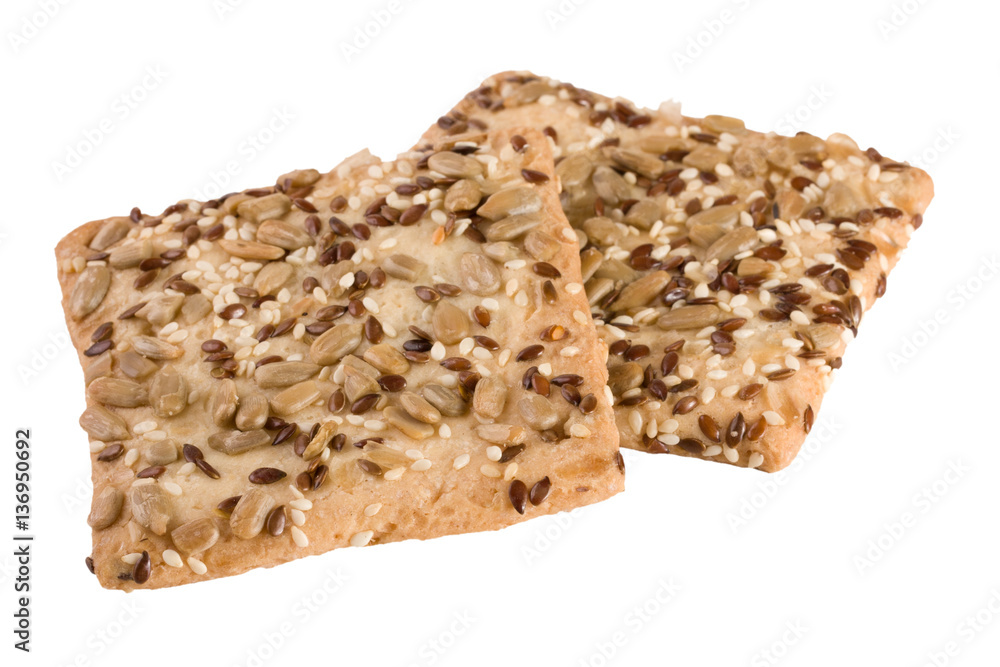 crispy bread with seeds of sunflower, flax and sesame seeds Isolated on white background crispy bread with seeds of sunflower, flax and sesame seeds Isolated on white background