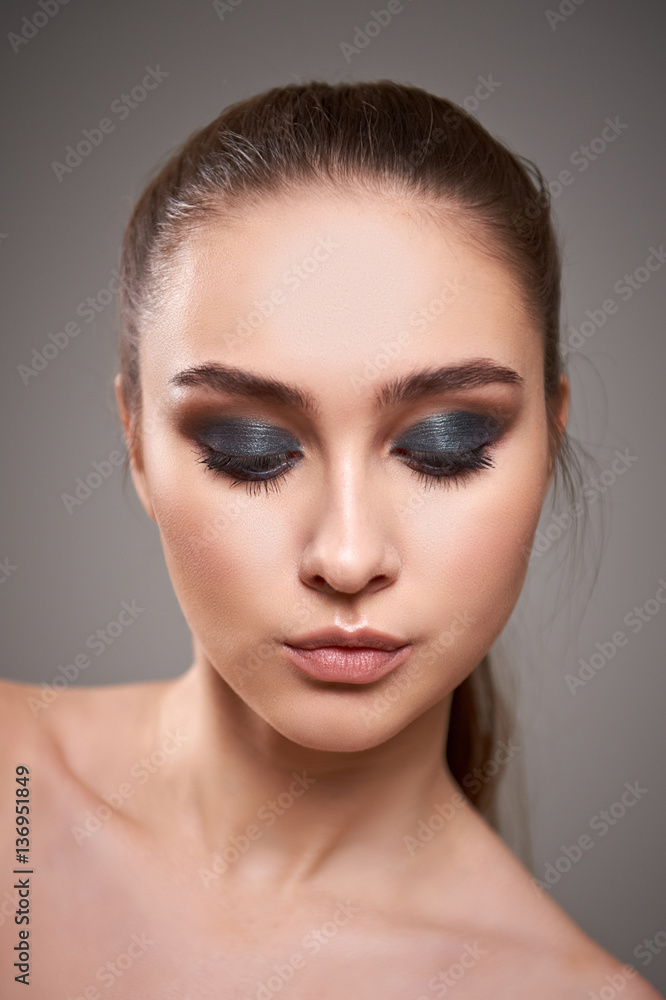 Young woman with beautiful make-up. Young woman with beautiful make-up.