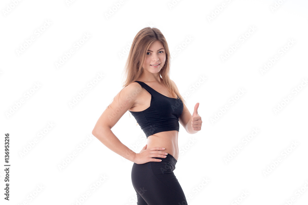 Beautiful athletic sexy girl looks into the distance and shows class Beautiful athletic sexy girl looks into the distance and shows class