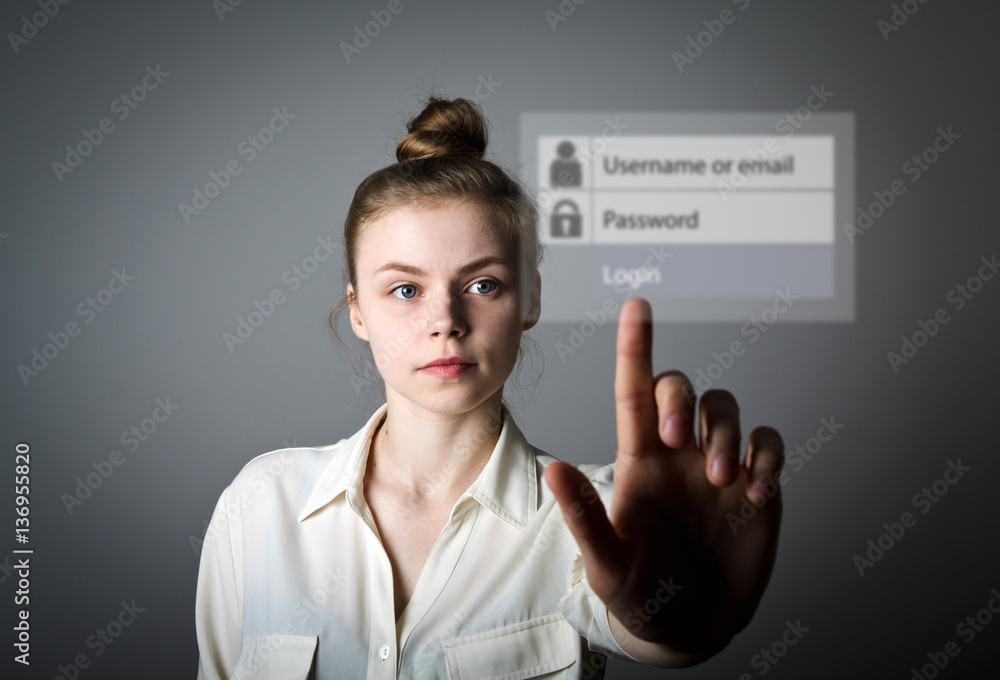 Girl pushing the button. Login and password Girl pushing the button. Login and password