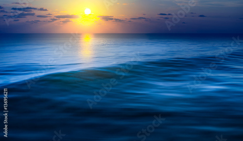 Hope concept.Sea wave with sunrise