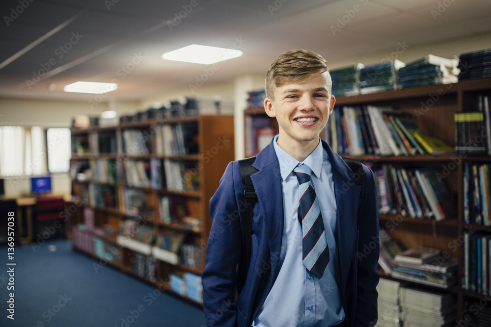 Fototapeta premium Teen Student In The Library