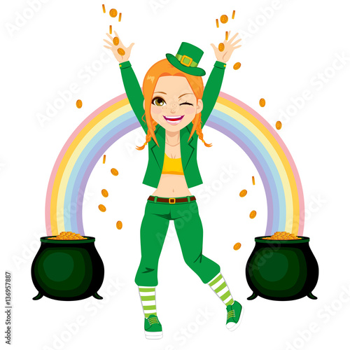 Young happy girl dressed with leprechaun costume sharing golden coins money