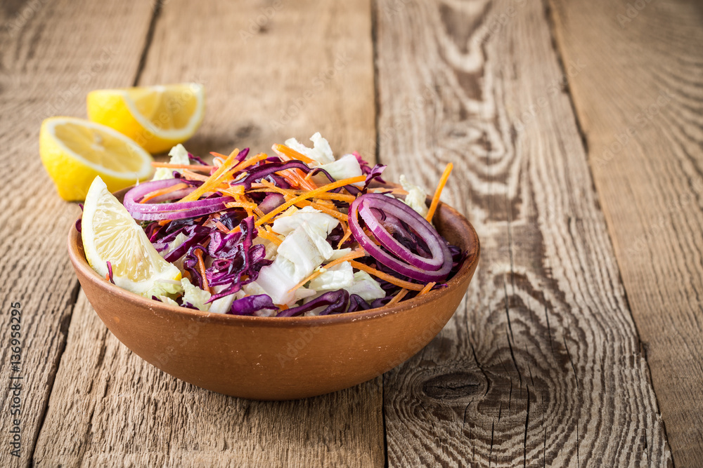 Chinese cabbage salad with red cabbage, carrot and red onion