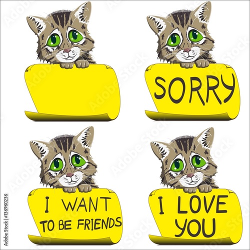 small kitten sits, holding a piece of paper with the inscription paws