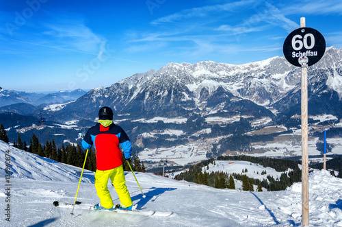 Tableau sur toile Skier skiing downhill in high mountains Wilder Kaiser