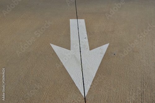 painted arrow sign