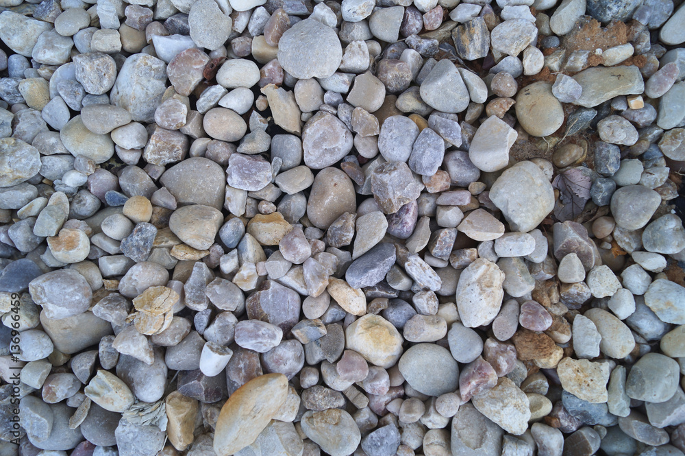 Decor grey stones pebbles on the ground