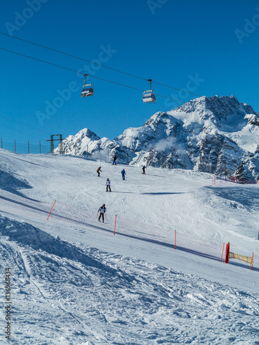 Ski resort in Valtellina - Skiers on the track - Valmalenco