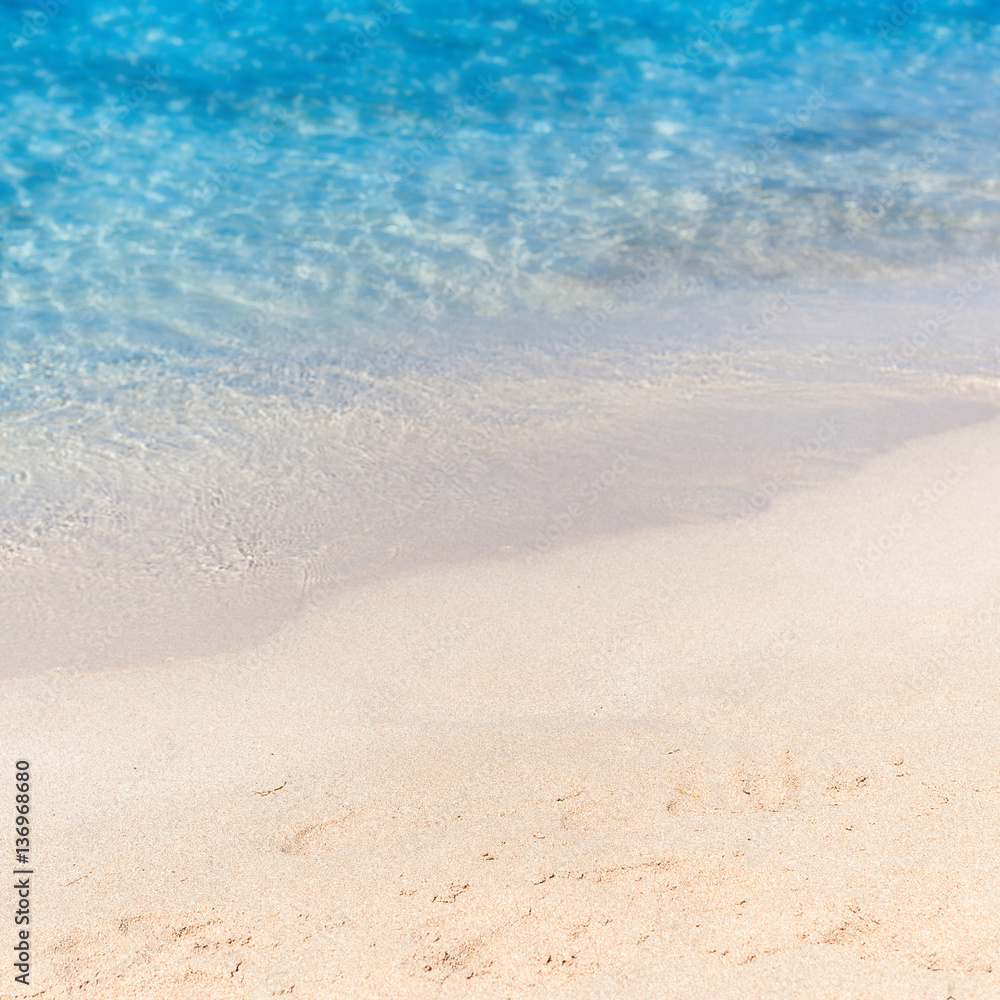 Close up sand with blurred sea sky / Paradise Tropical beach bac Close up sand with blurred sea sky / Paradise Tropical beach bac
