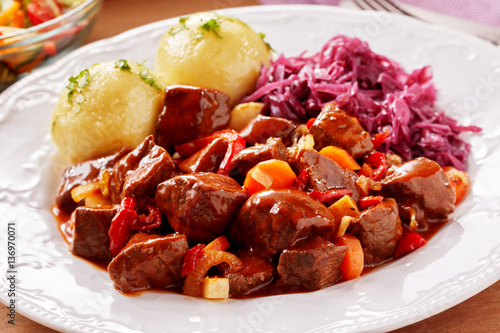 Vegetable and chunky beef stew served in dish