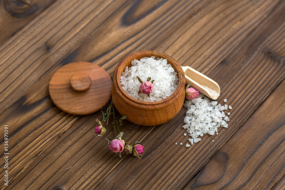 Sea salt for spa and beauty on the wooden background Sea salt for spa and beauty on the wooden background