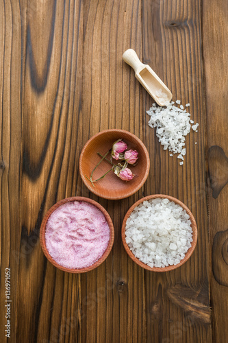 Sea salt for spa and beauty on the wooden background