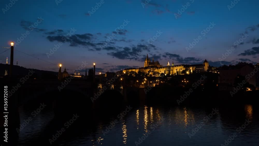 Spectacular timelapse of old town and famous landmark Vitus Cathedral at late evening Spectacular timelapse of old town and famous landmark Vitus Cathedral at late evening